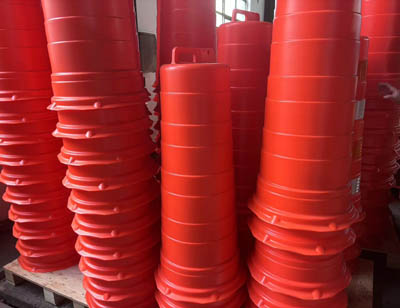 half-finished traffic drums