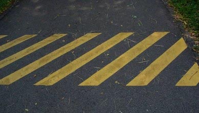 parallel yellow striped road marking