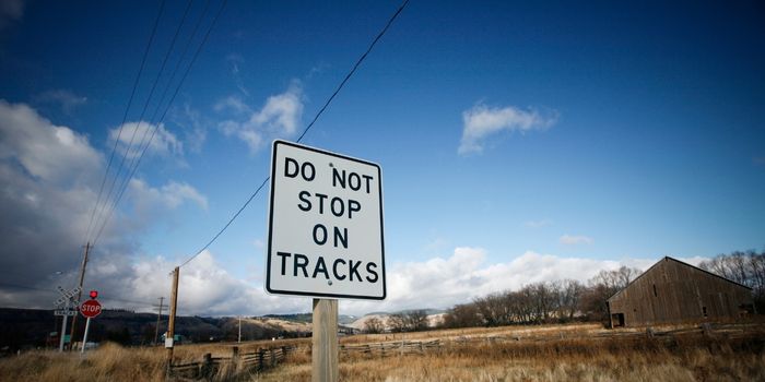 Do Not Stop on Tracks Sign
