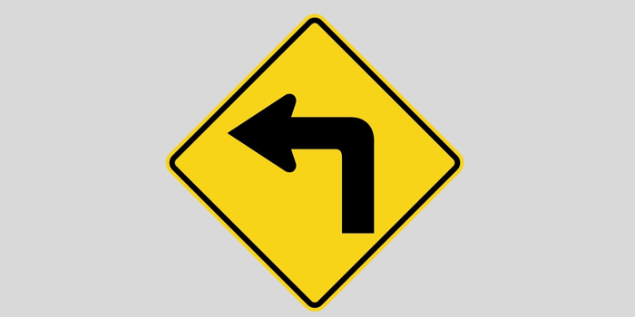 Placa de curva acentuada à esquerda