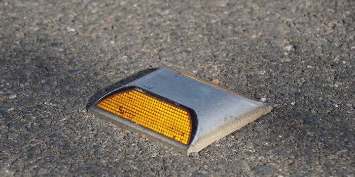 Olhos de gato na estrada