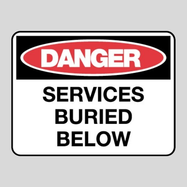 Danger Services Buried Below Sign