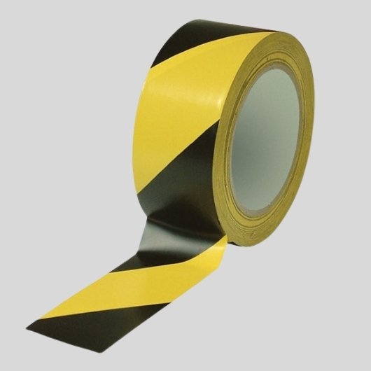 Cinta de señalización de suelo negra y amarilla