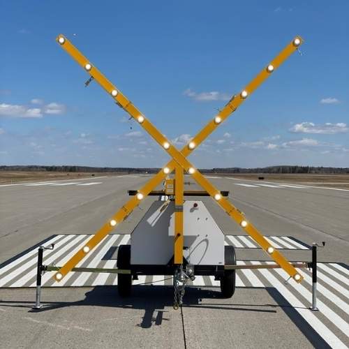 Balise lumineuse en forme de X pour la fermeture de la piste